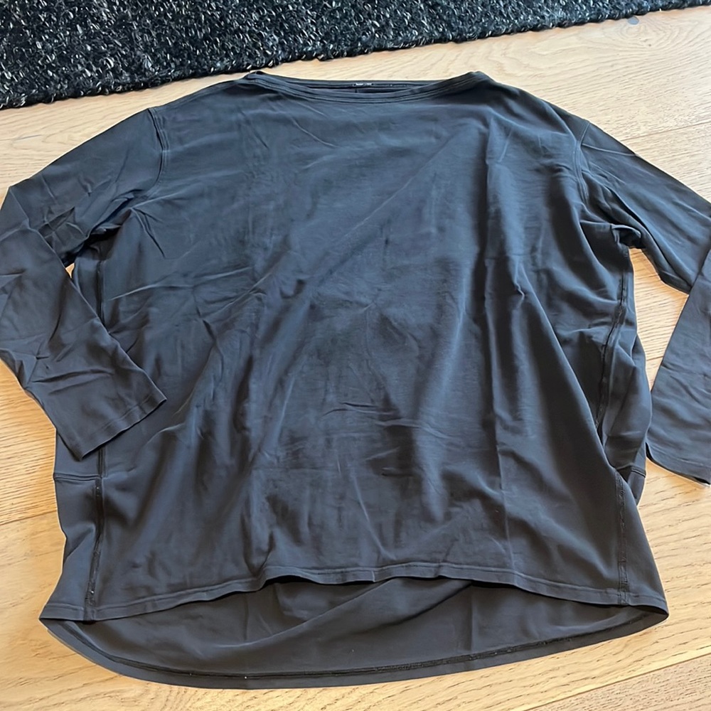 2 Lululemon back in action long sleeve shirts (black and purple)